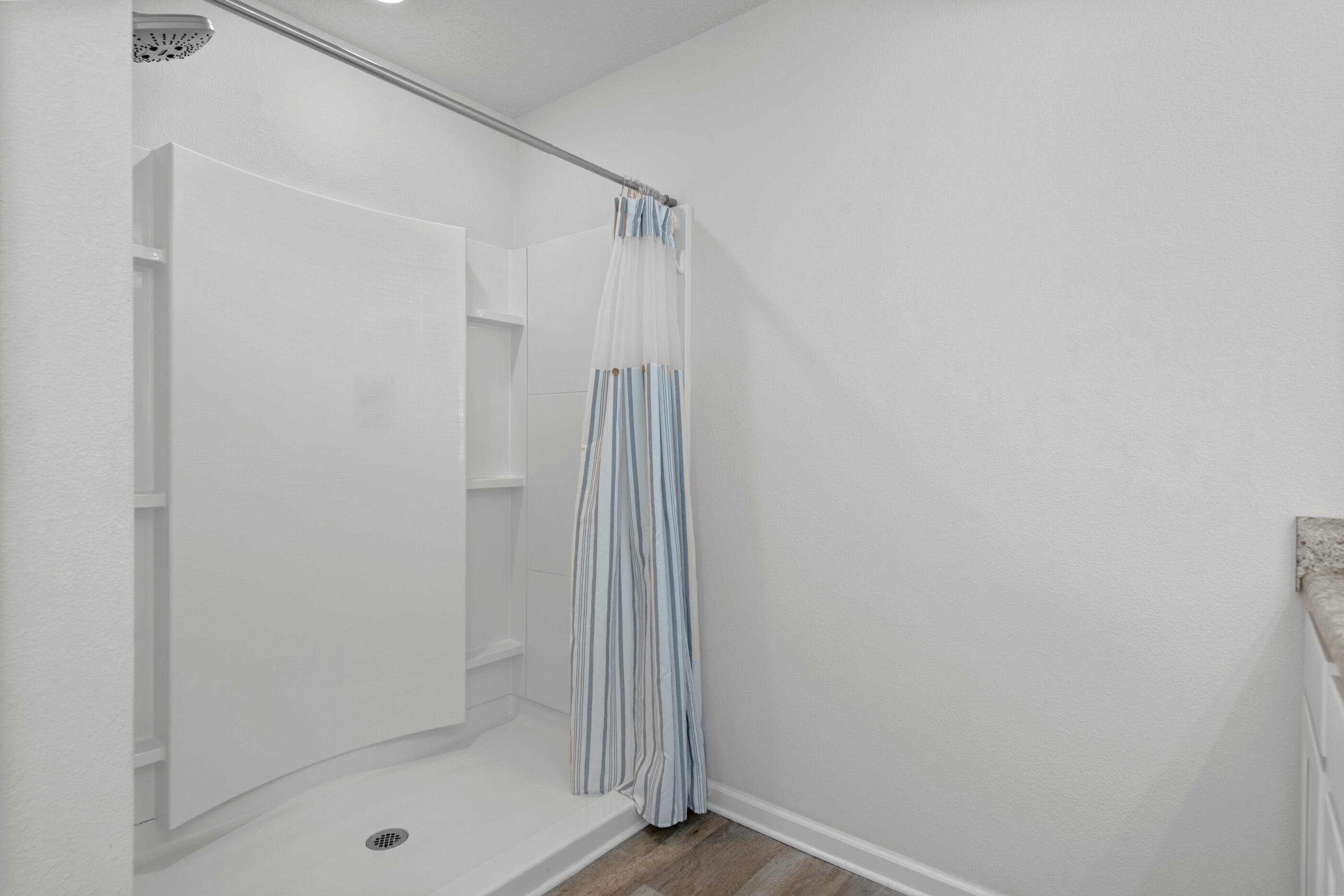 193 This Way Freeport, FL 32439 - Photo 31 of 56 a bathroom with a glass door