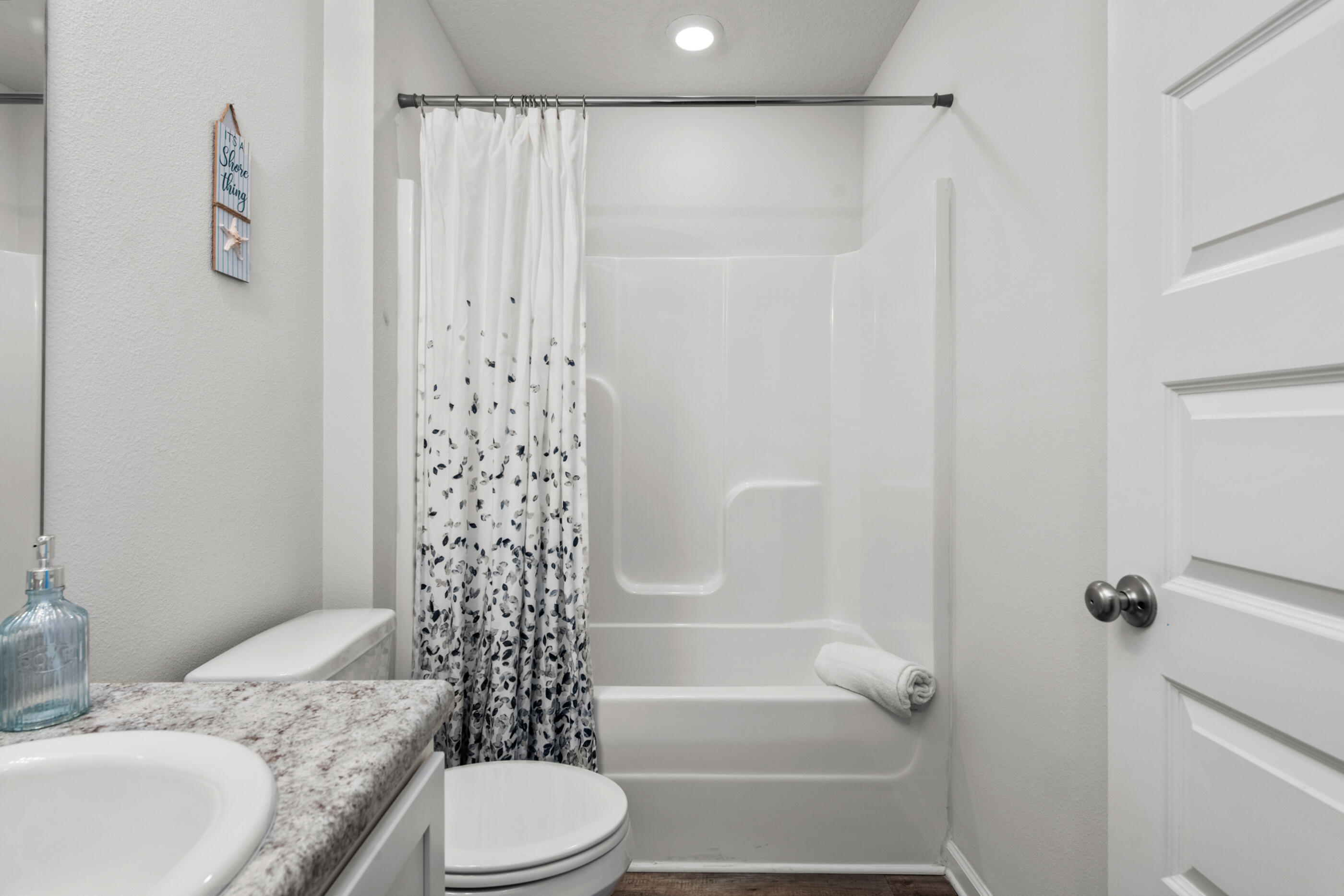 193 This Way Freeport, FL 32439 - Photo 35 of 56 a bathroom with a sink a toilet and shower