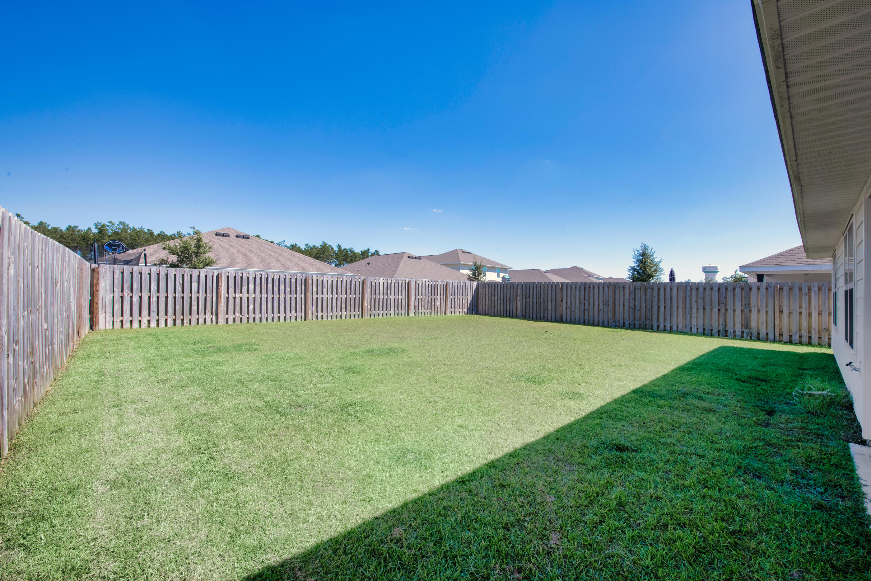 193 This Way Freeport, FL 32439 - Photo 39 of 56 a view of a backyard with a fence