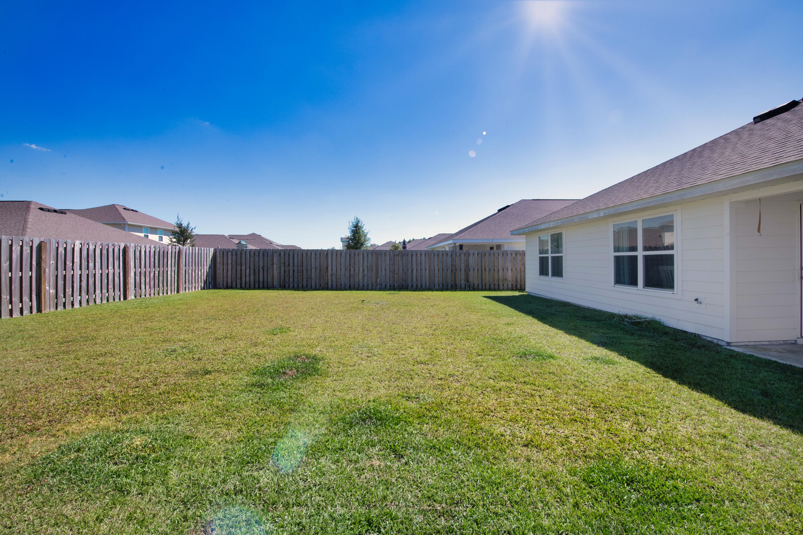 193 This Way Freeport, FL 32439 - Photo 40 of 56 a house view with swimming pool in front of it