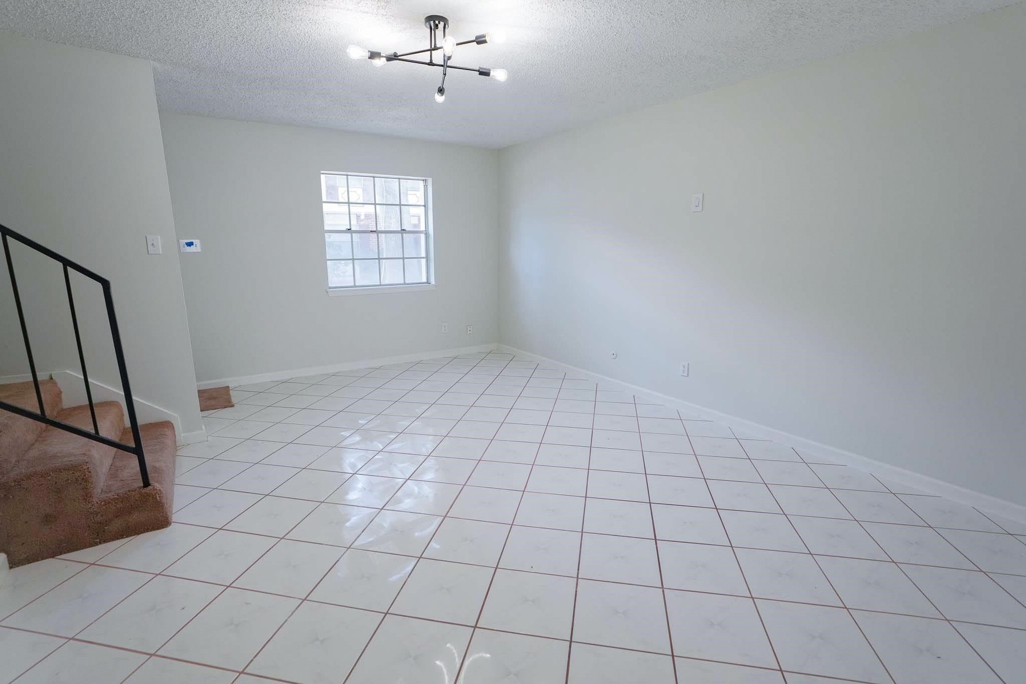 1255 Witte Road, Unit 17 Houston, TX 77055 - Photo 4 of 17 an empty room with windows