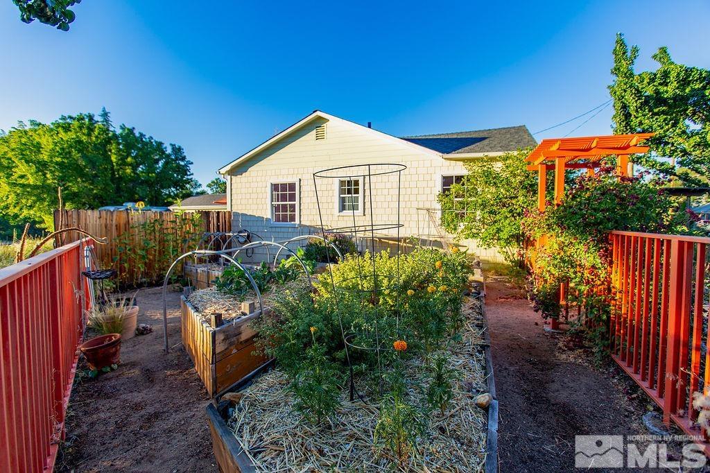 1290 Bon Rea Way Reno, NV 89503 - Photo 3 of 23 a view of a house with a yard and plants