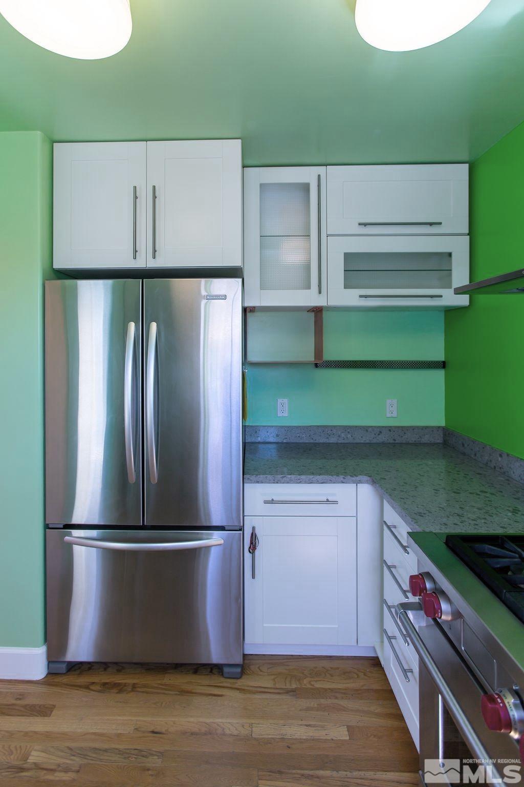 1290 Bon Rea Way Reno, NV 89503 - Photo 8 of 23 a kitchen with cabinets and stainless steel appliances