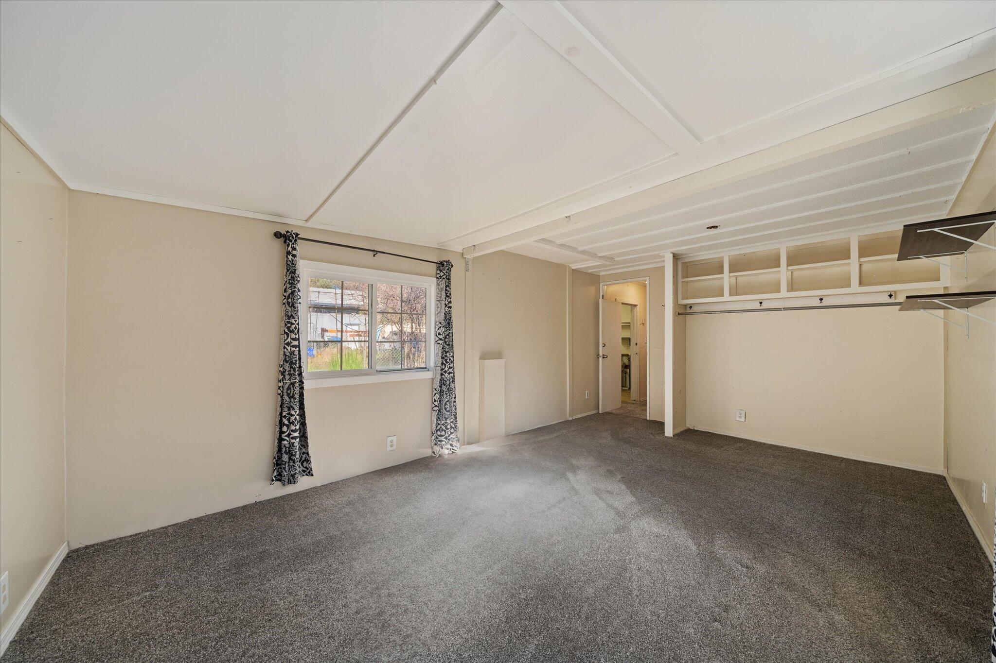 3150 Haley Lane Redding, CA 96003 - Photo 12 of 23 an empty room with windows