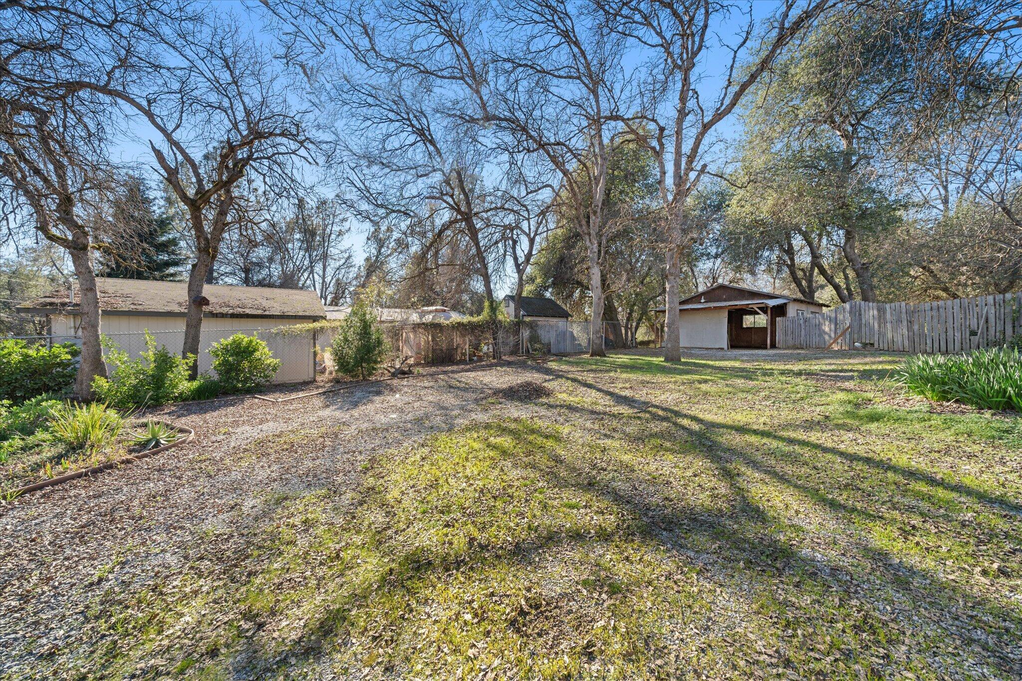 3150 Haley Lane Redding, CA 96003 - Photo 17 of 23 a front view of a house with garden