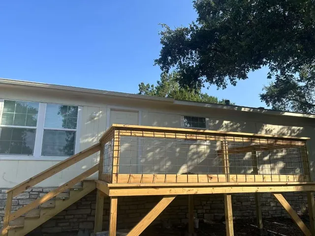 a view of swimming pool with a tennis court