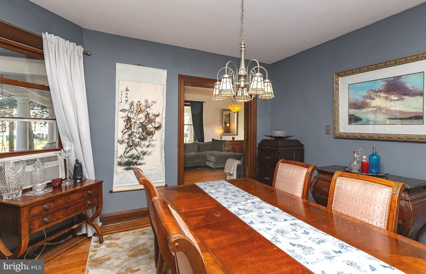 251 Sagamore Road Havertown, PA 19083 - Photo 11 of 41 a living room with furniture a chandelier and a dining table