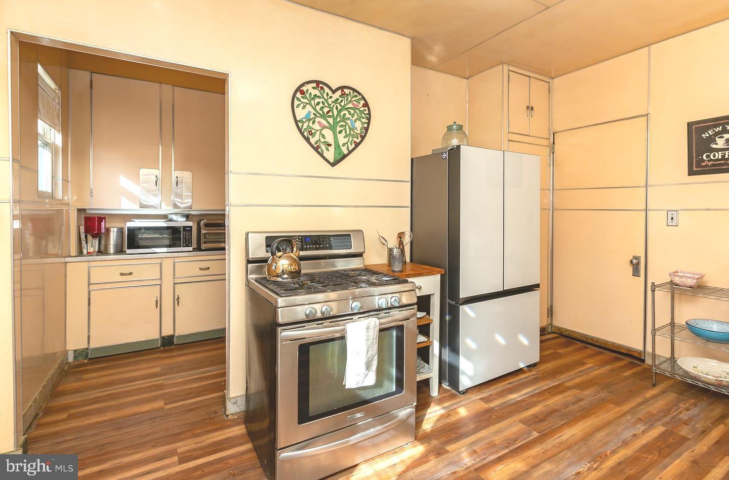 251 Sagamore Road Havertown, PA 19083 - Photo 14 of 41 a kitchen with a stove and a refrigerator