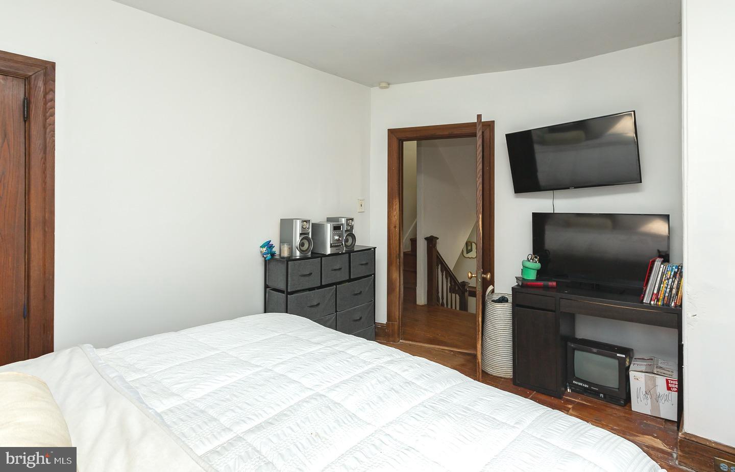 251 Sagamore Road Havertown, PA 19083 - Photo 19 of 41 a bedroom with a bed and a flat screen tv