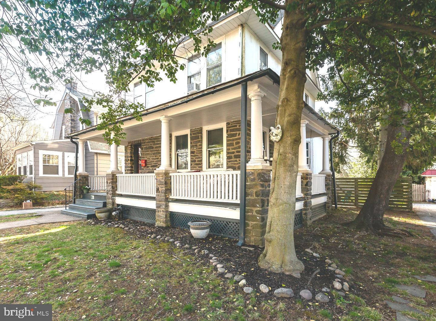 251 Sagamore Road Havertown, PA 19083 - Photo 2 of 41 a view of a house with a yard and wooden fence