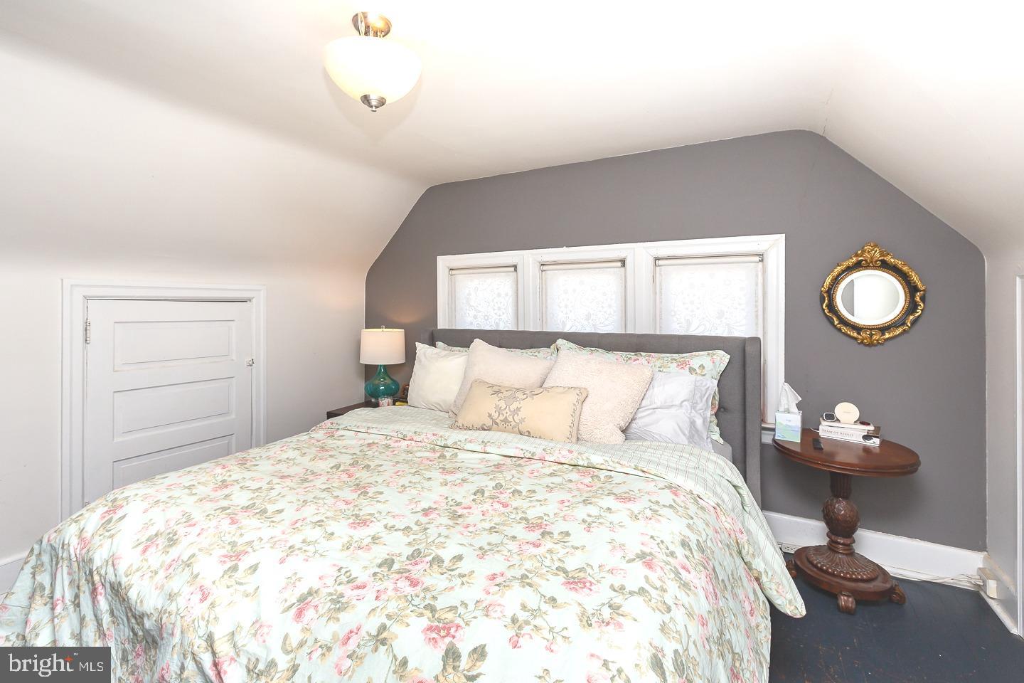 251 Sagamore Road Havertown, PA 19083 - Photo 25 of 41 a bedroom with a bed and painting on the wall