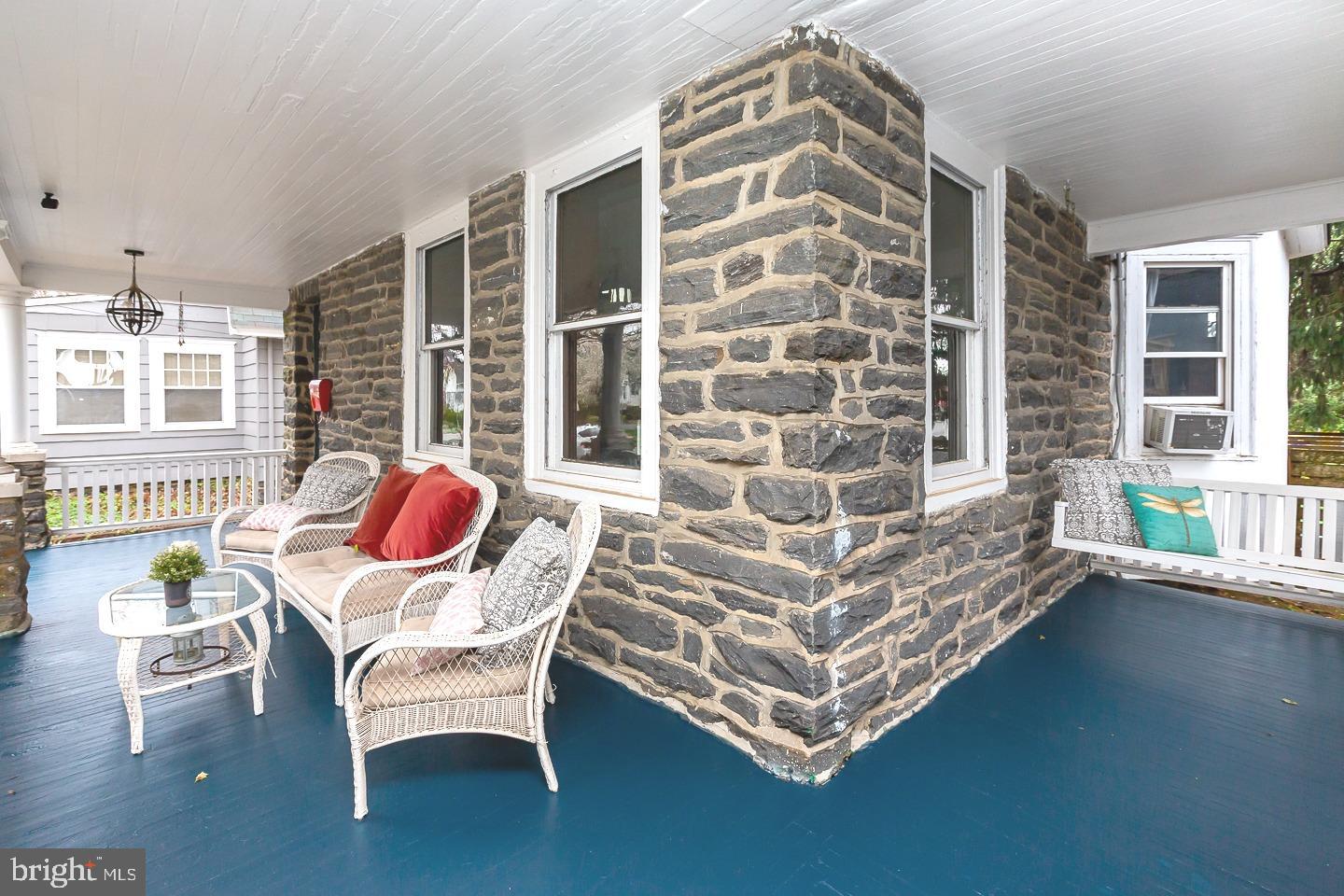 251 Sagamore Road Havertown, PA 19083 - Photo 3 of 41 a bed room with a bed and two windows