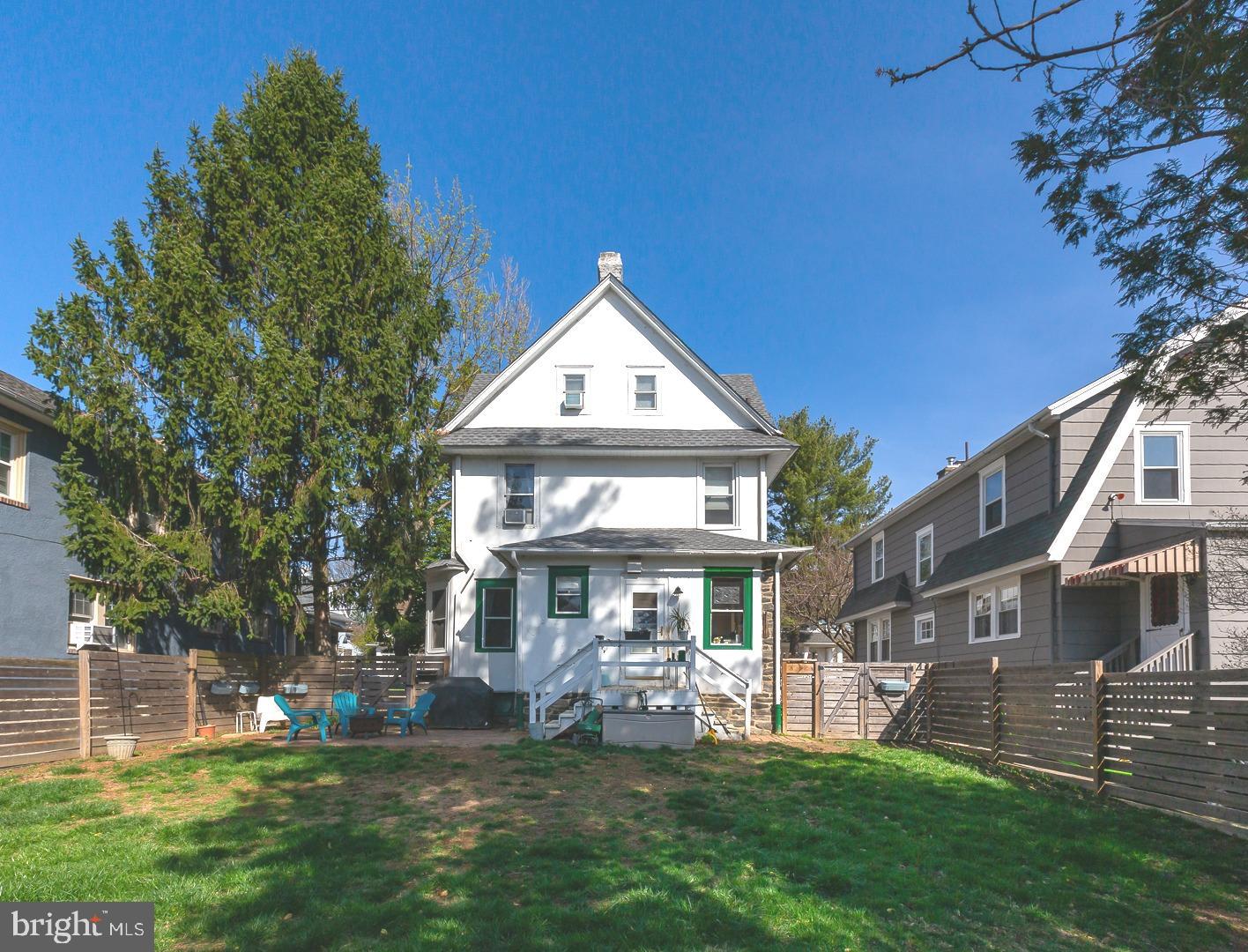 251 Sagamore Road Havertown, PA 19083 - Photo 37 of 41 a front view of a house with a garden and trees