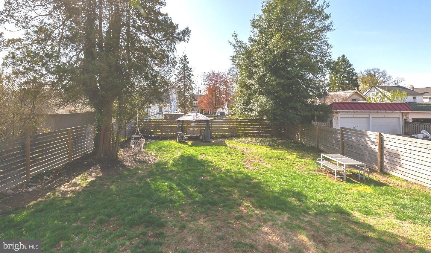 251 Sagamore Road Havertown, PA 19083 - Photo 38 of 41 a view of yard with small fountain and large trees