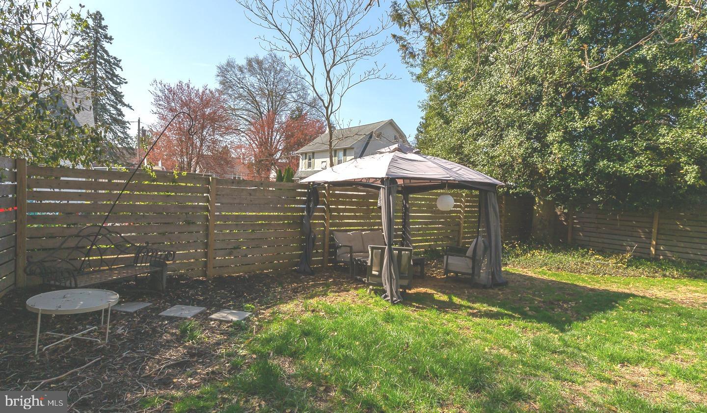 251 Sagamore Road Havertown, PA 19083 - Photo 39 of 41 a view of a small yard with wooden fence