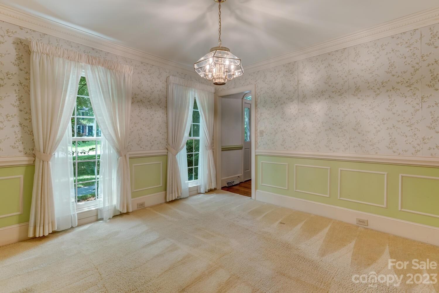10215 Hanover Glen Road Charlotte, NC 28210 - Photo 18 of 40 a view of an empty room with a window