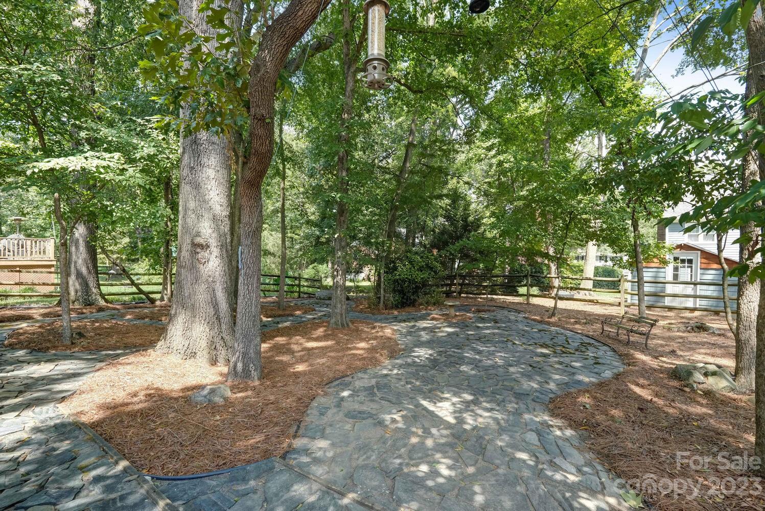 10215 Hanover Glen Road Charlotte, NC 28210 - Photo 39 of 40 a view of a tree in the middle of a yard