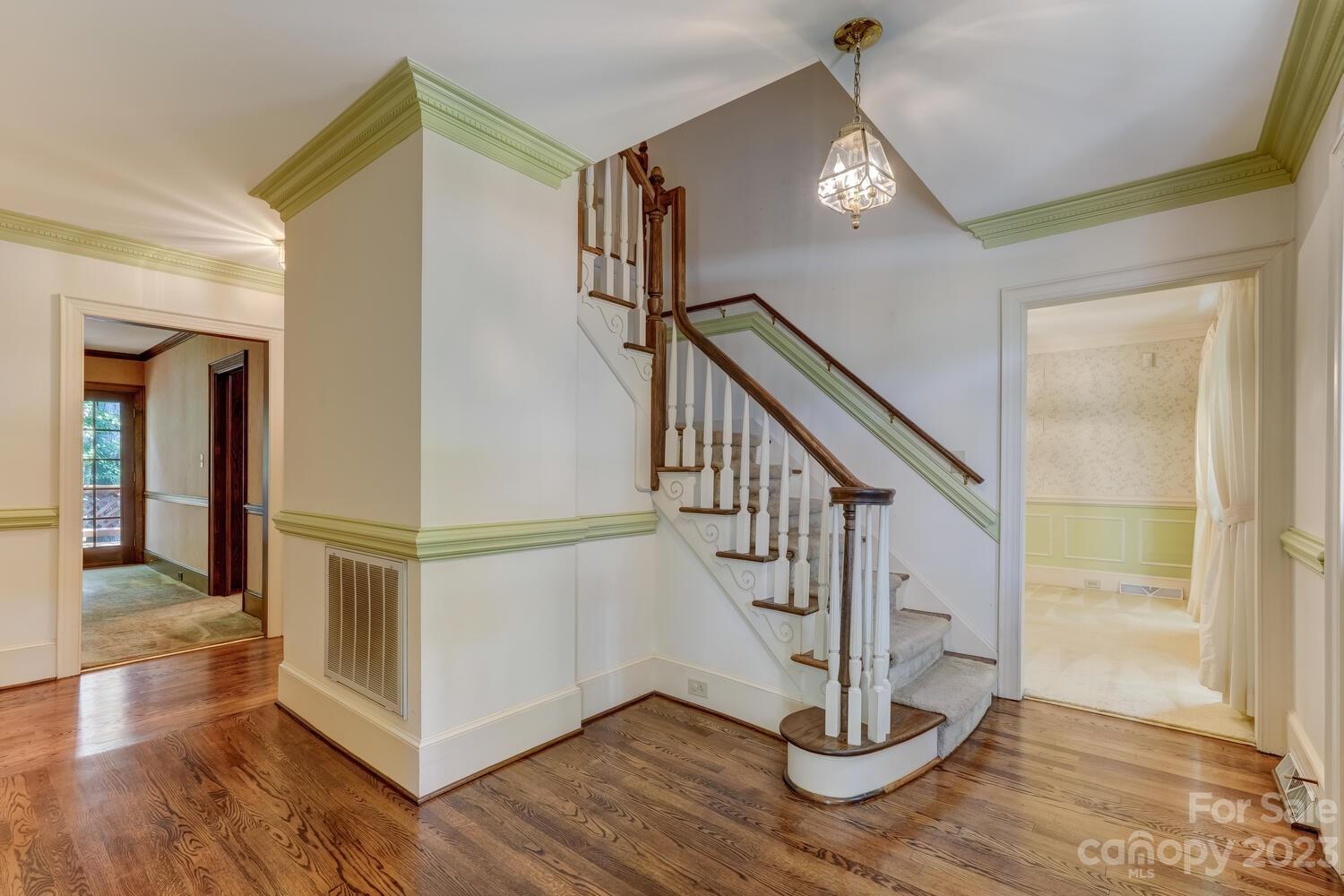 10215 Hanover Glen Road Charlotte, NC 28210 - Photo 5 of 40 a view of entryway and hall with wooden floor