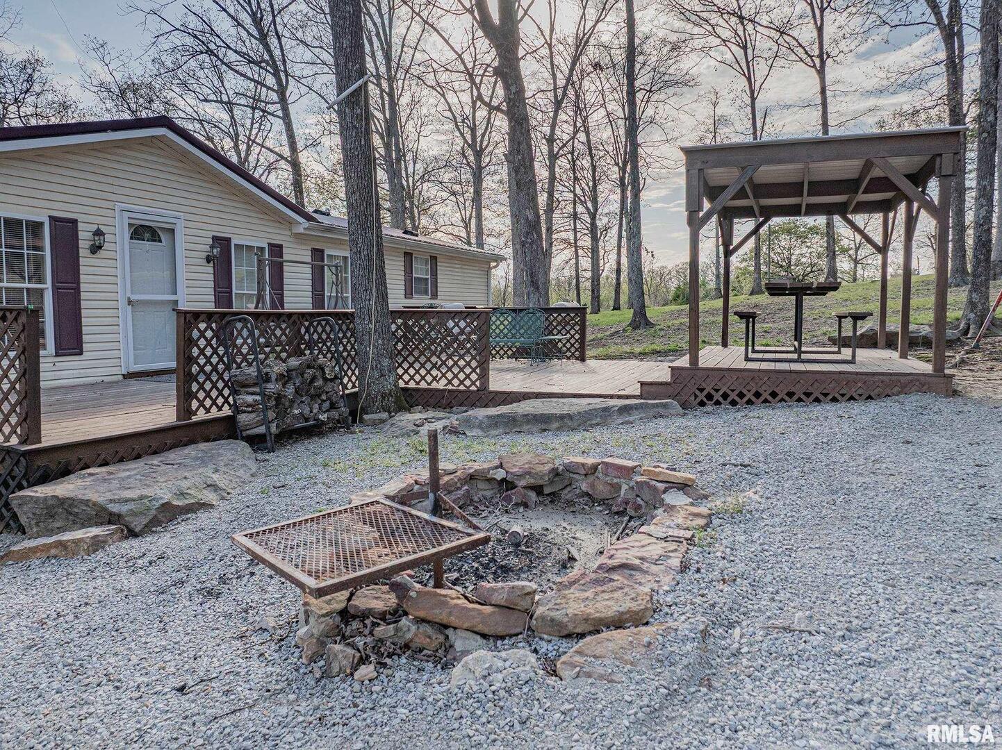 565 Dutton Chapel Road Herod, IL 62947 - Photo 11 of 54 a front view of a house with garden