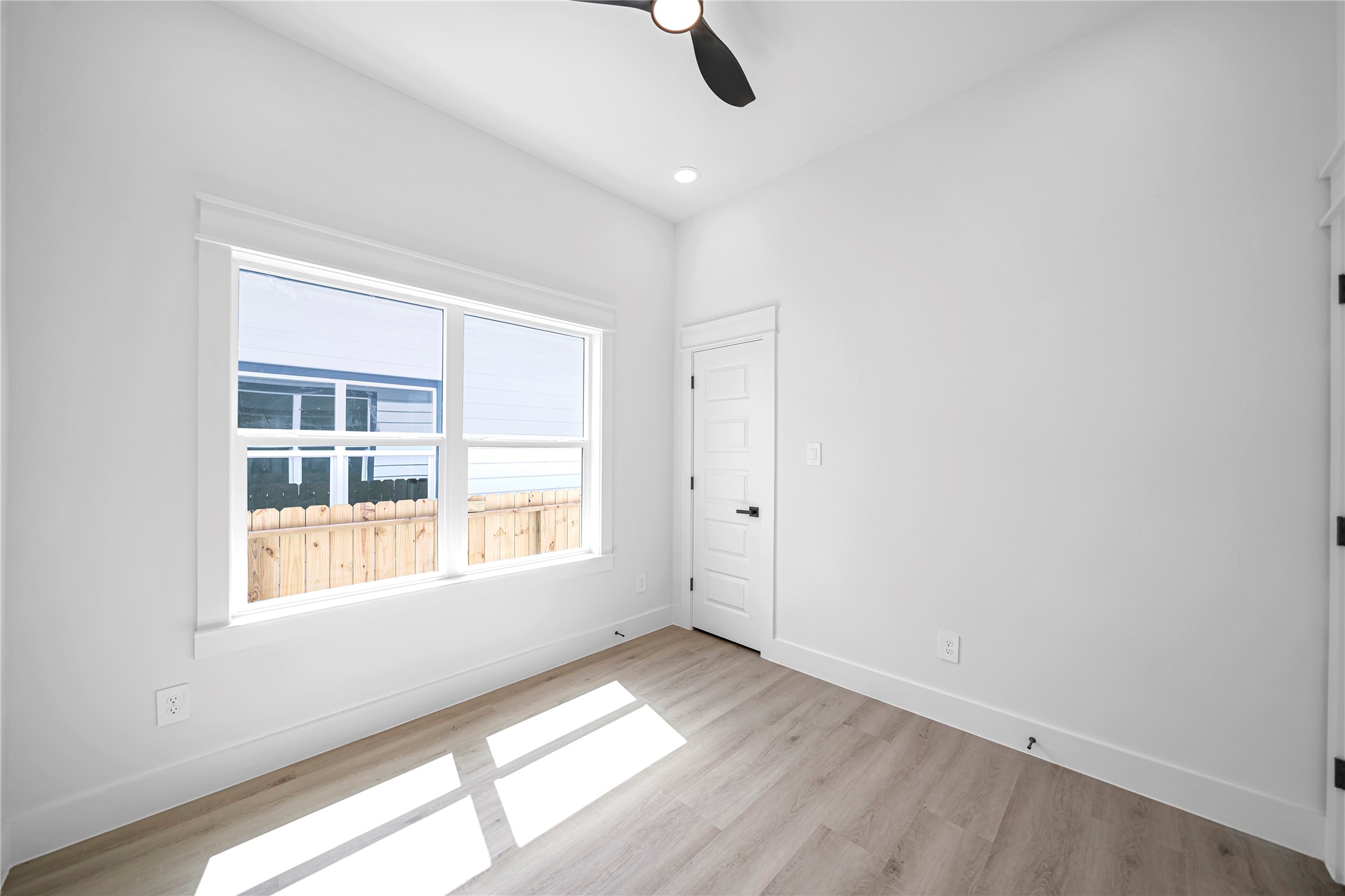 4834 Higgins Street, Unit B Houston, TX 77033 - Photo 21 of 34 a view of an empty room with a window