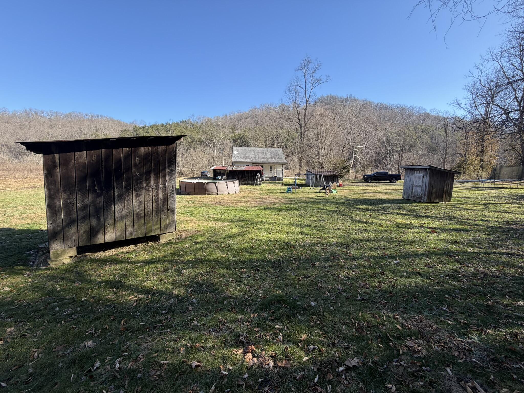 91 Quinton Callahan Road Booneville, KY 41314 - Photo 25 of 39 4 storage buildings behind the home!