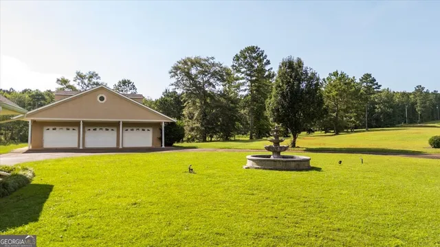 a front view of a house with swimming pool
