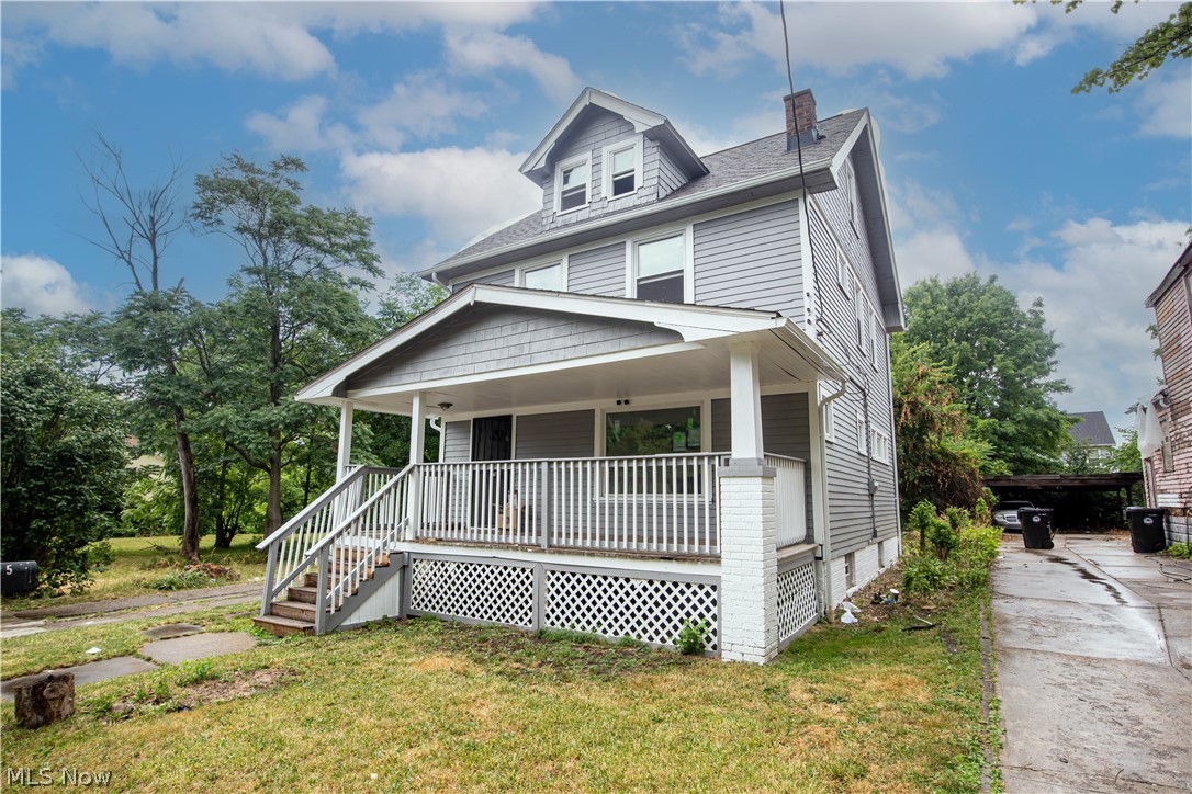 9505 Aetna Road Cleveland, OH 44105 - Photo 1 of 25 View of front of house featuring a porch and a front lawn