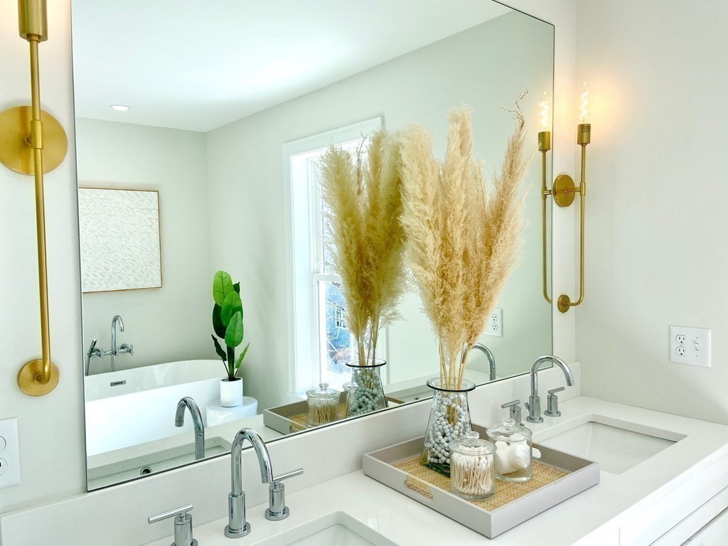 21 Quarry Road, Unit 21 Acton, MA 01720 - Photo 9 of 15 a living room with furniture and a large window