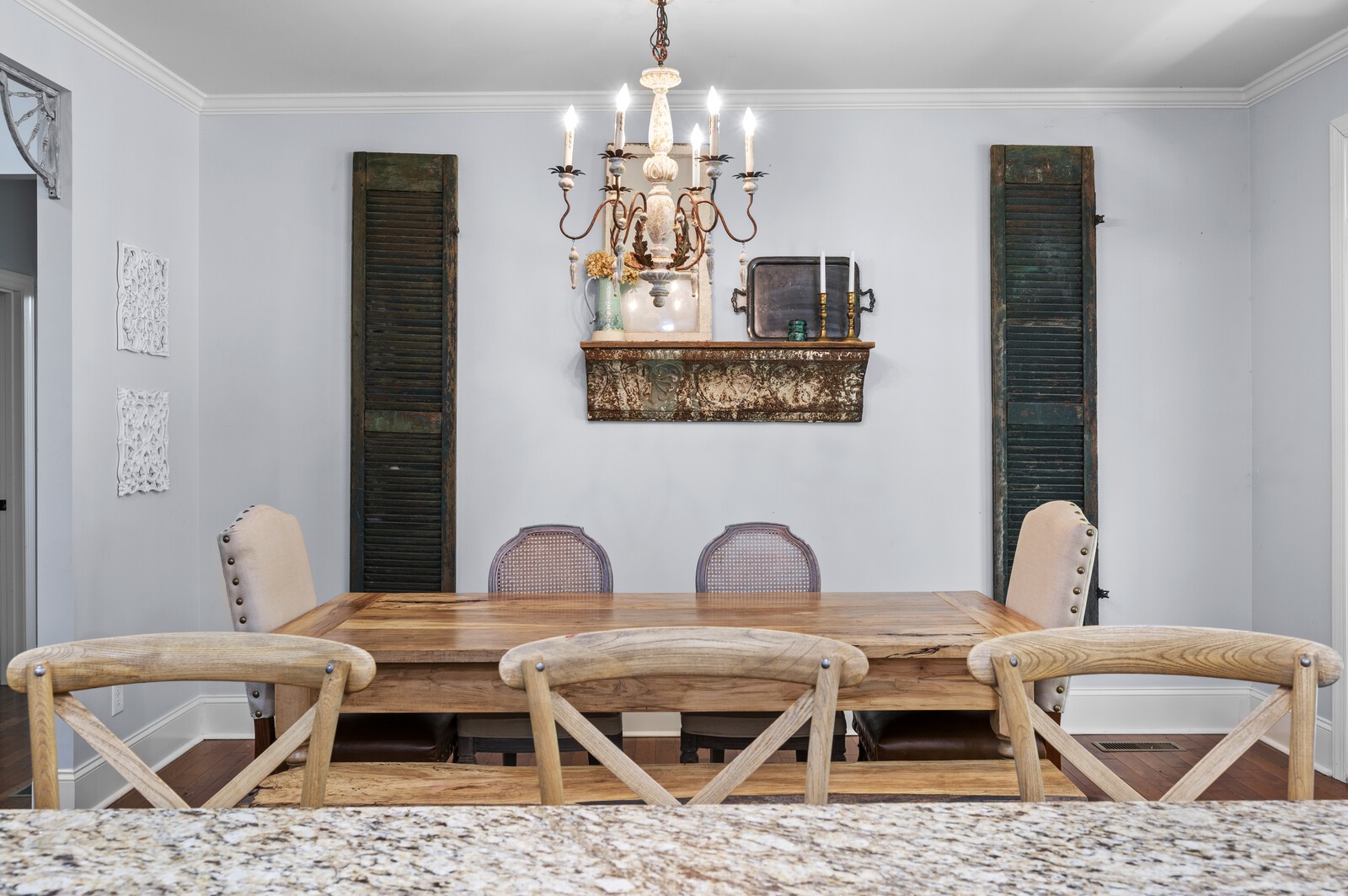 1082 Meeks Cemetery Road Burns, TN 37029 - Photo 12 of 26 a view of a dining room with furniture and chandelier