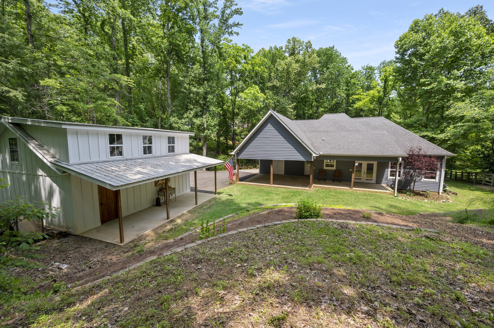 1082 Meeks Cemetery Road Burns, TN 37029 - Photo 21 of 26 a front view of a house with garden