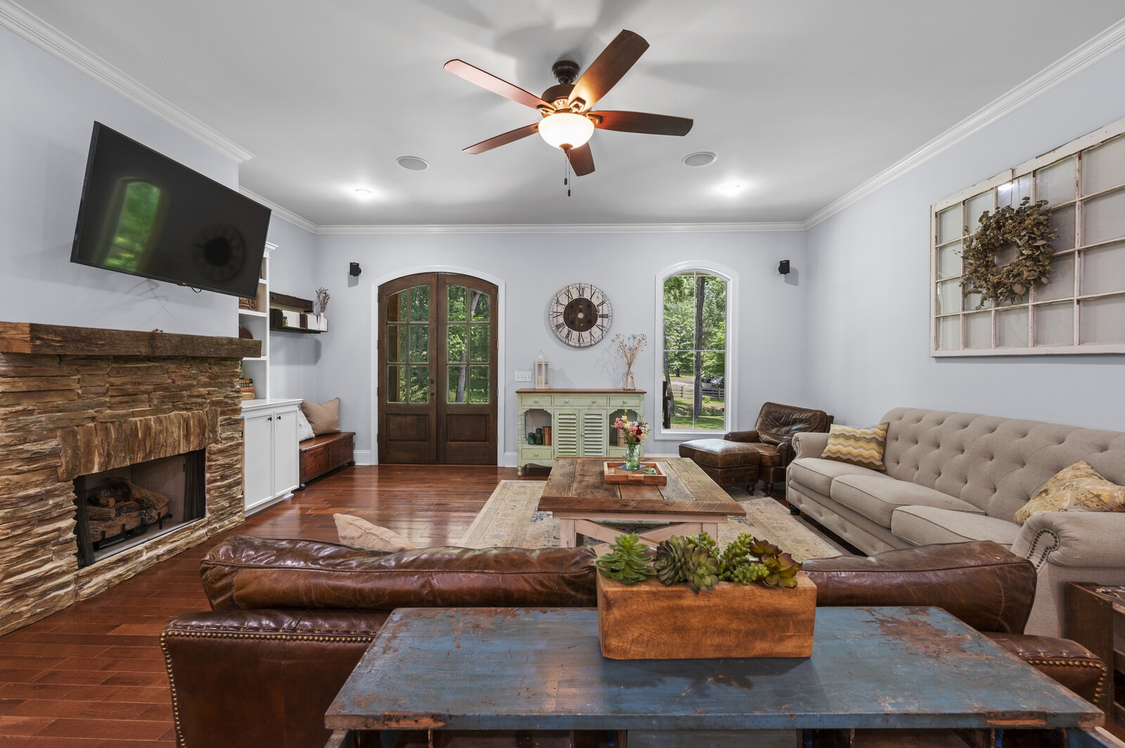1082 Meeks Cemetery Road Burns, TN 37029 - Photo 5 of 26 a living room with furniture fireplace and flat screen tv