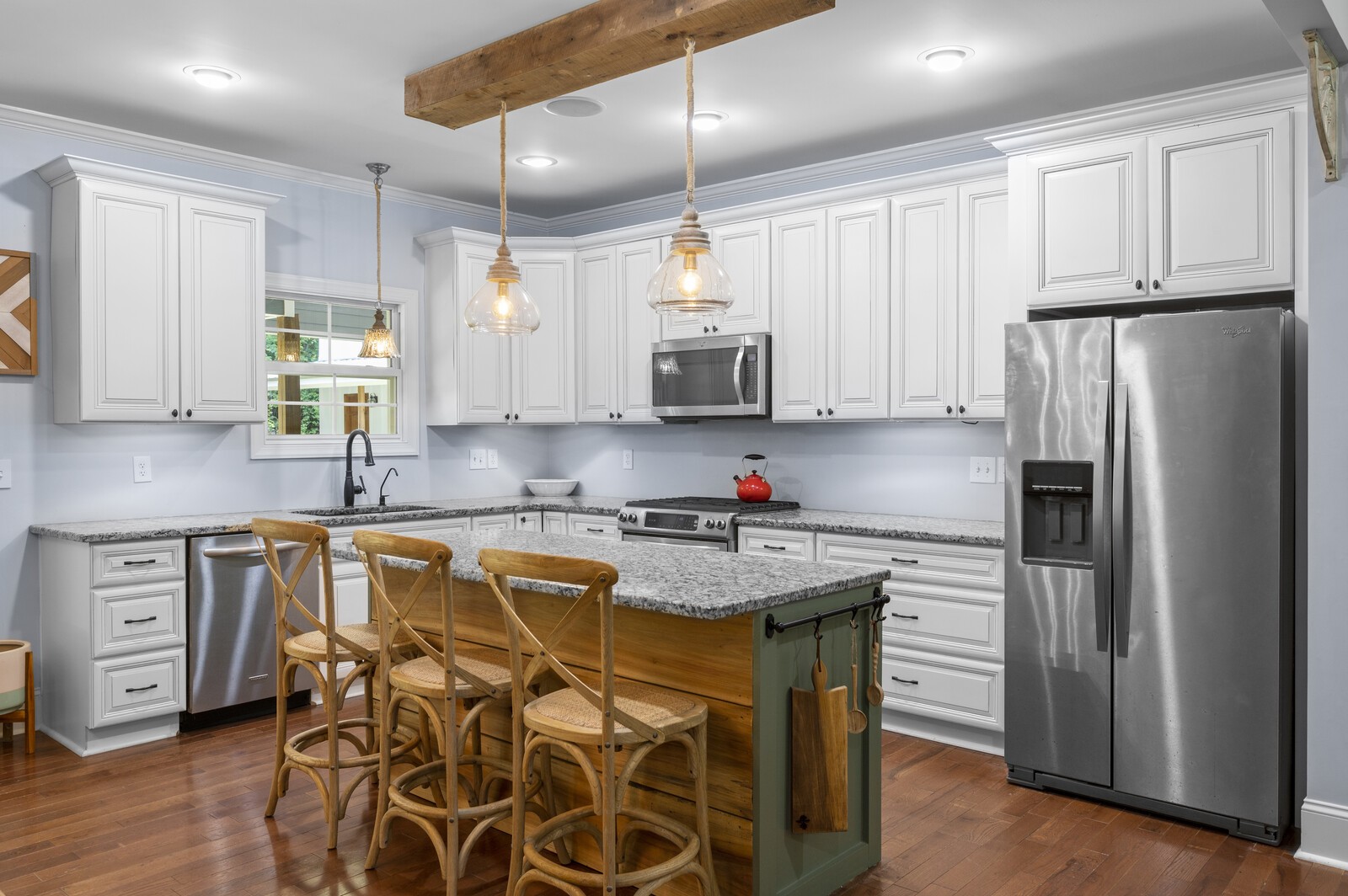 1082 Meeks Cemetery Road Burns, TN 37029 - Photo 8 of 26 a kitchen with stainless steel appliances granite countertop a refrigerator sink and cabinets