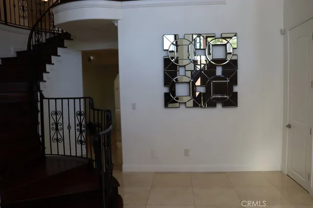 a view of an empty room with a flat screen tv