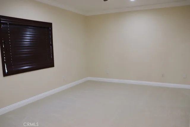 a bathroom with a bathtub sink and mirror