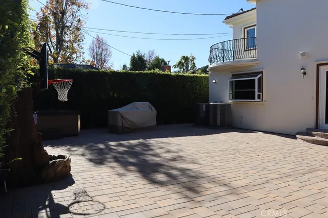 a view of kitchen and wooden floor