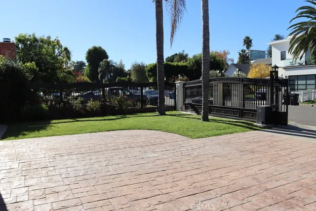a view of a livingroom with furniture and hardwood floor