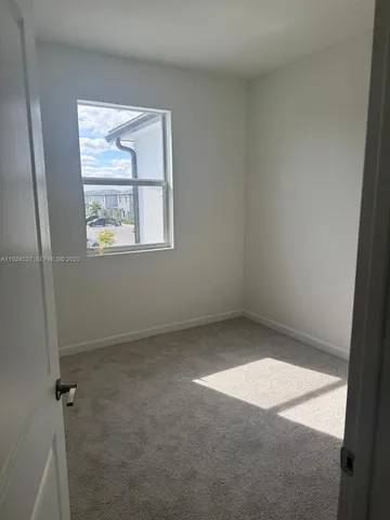 an empty room with closet