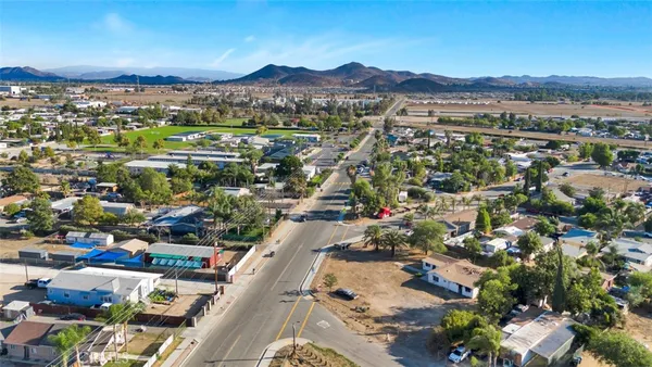 an aerial view of residential houses and city view