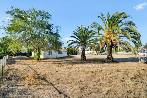a house with trees in front of it