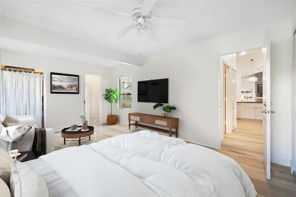 a bed room with a bed and a couch