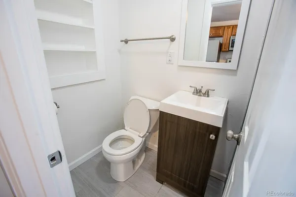 a bathroom with a sink and a toilet
