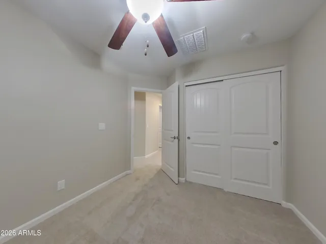 a bathroom with a double vanity sink and mirror