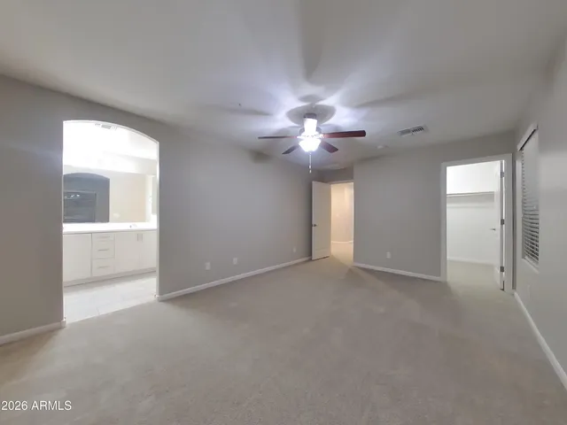 a kitchen with granite countertop a stove and a sink