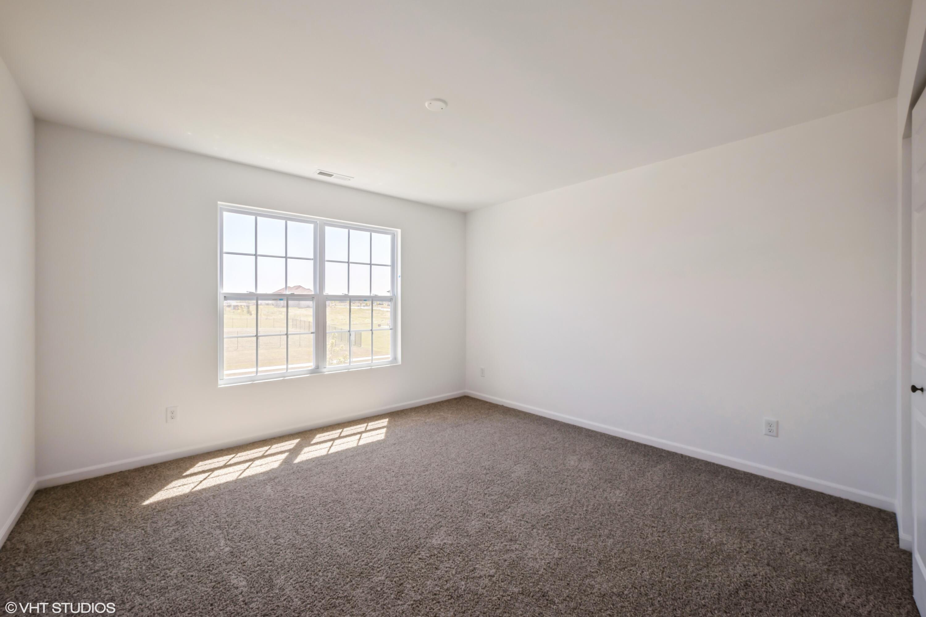2885 East 105th Avenue Crown Point, IN 46307 - Photo 19 of 30 an empty room with a window