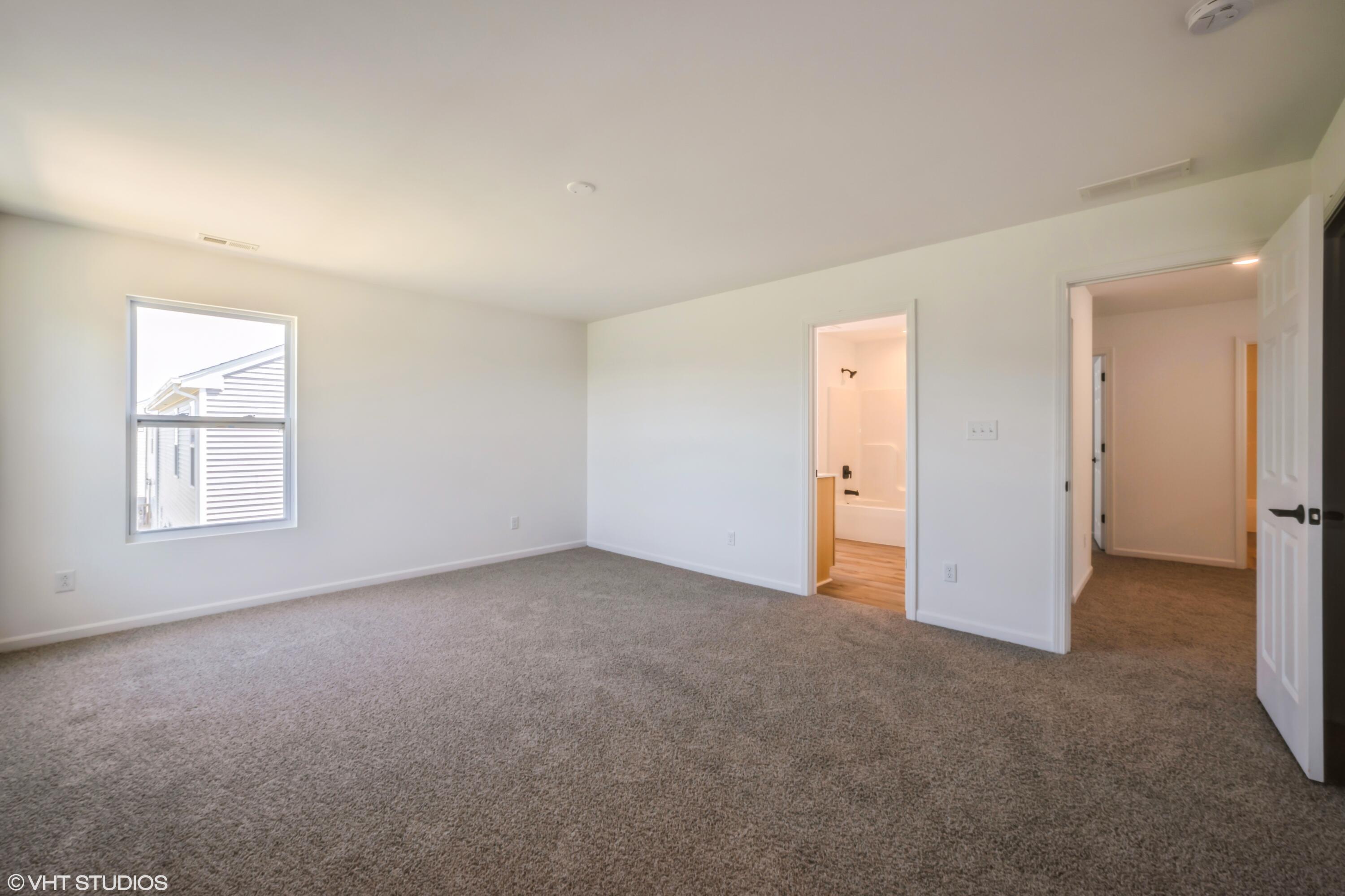 2885 East 105th Avenue Crown Point, IN 46307 - Photo 22 of 30 an empty room with windows and closet