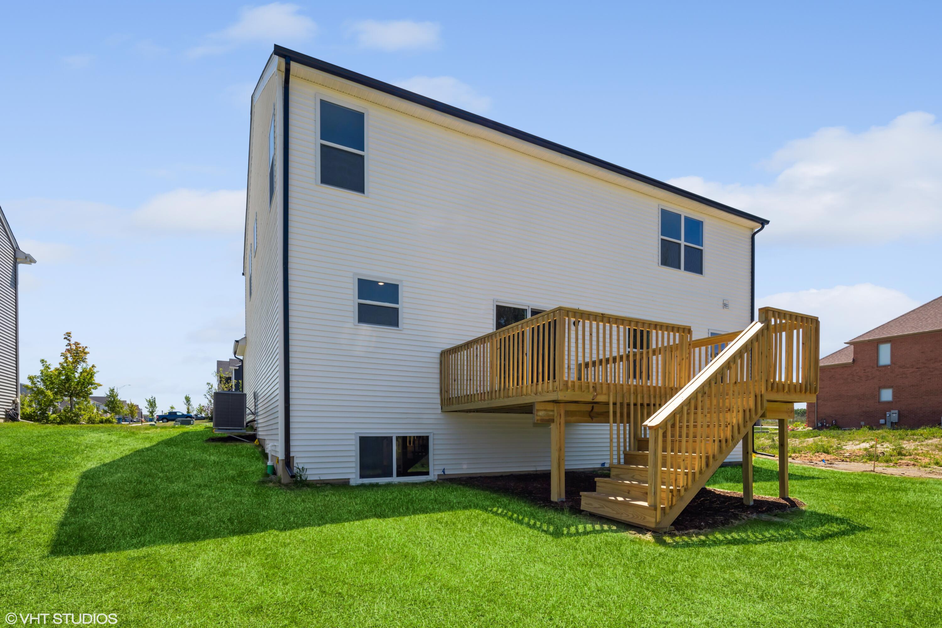 2885 East 105th Avenue Crown Point, IN 46307 - Photo 30 of 30 a front view of a house with a yard