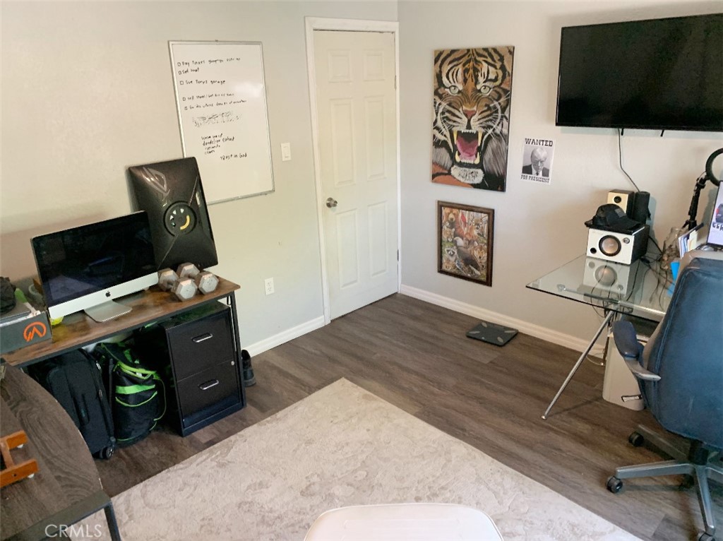 20415 Myron Street Perris, CA 92570 - Photo 13 of 29 a bedroom with a workspace