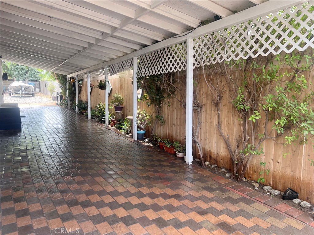 20415 Myron Street Perris, CA 92570 - Photo 21 of 29 an empty room with wooden floor and windows