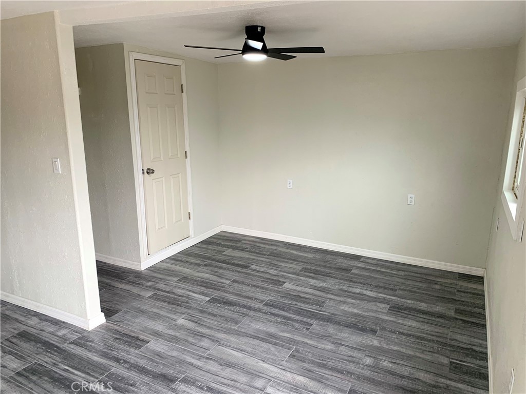 20415 Myron Street Perris, CA 92570 - Photo 25 of 29 a view of empty room with wooden floor