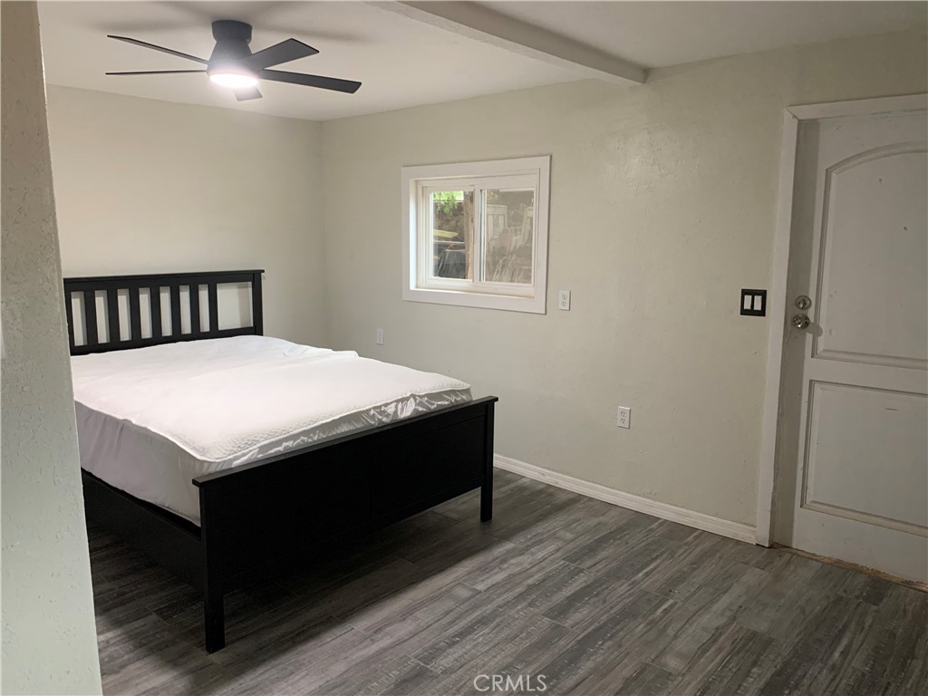 20415 Myron Street Perris, CA 92570 - Photo 26 of 29 a room with a bed and a window